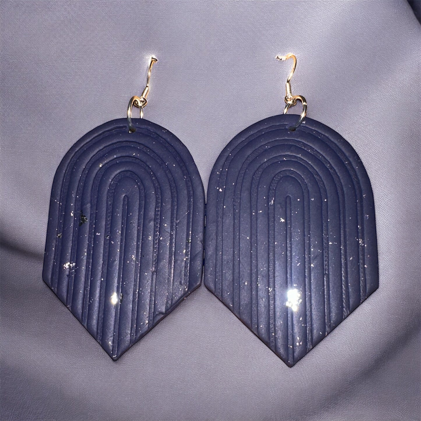 Cosmic Veiled Arches